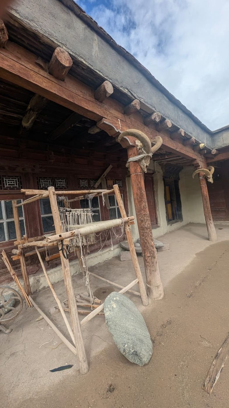 The wooden hand loom on the veranda