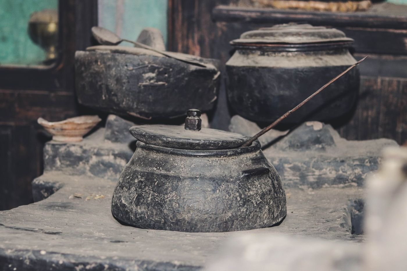 Old pots resting on the stove