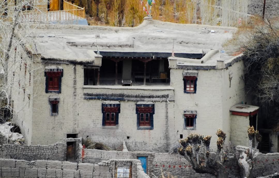 The 200-year-old Gyapthago house with mud walls and red Ladakhi windows