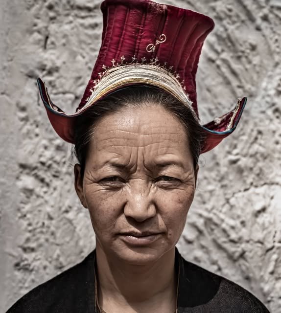A Ladakhi woman in a traditional hat
